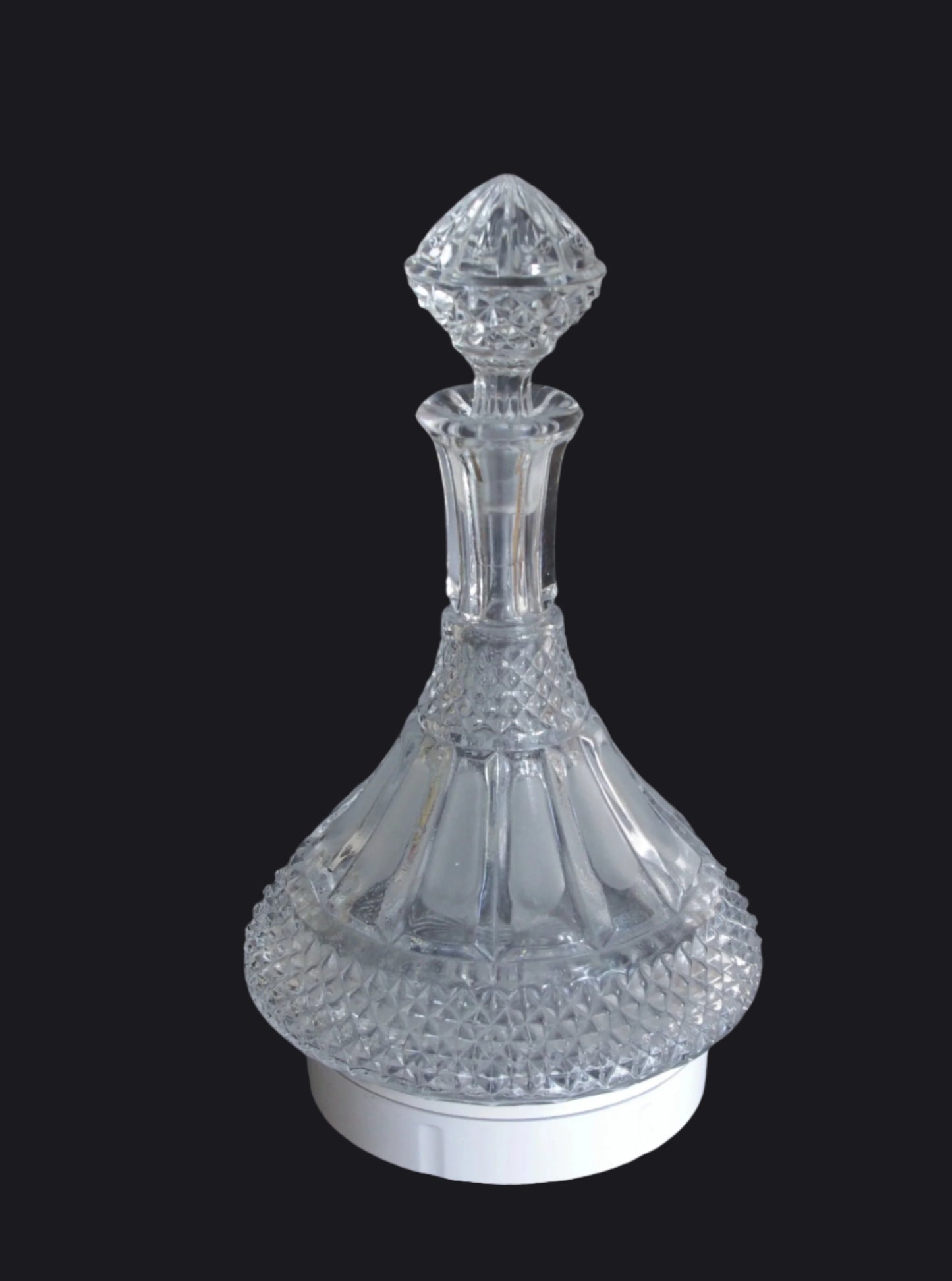 Crystal decanter on a black background