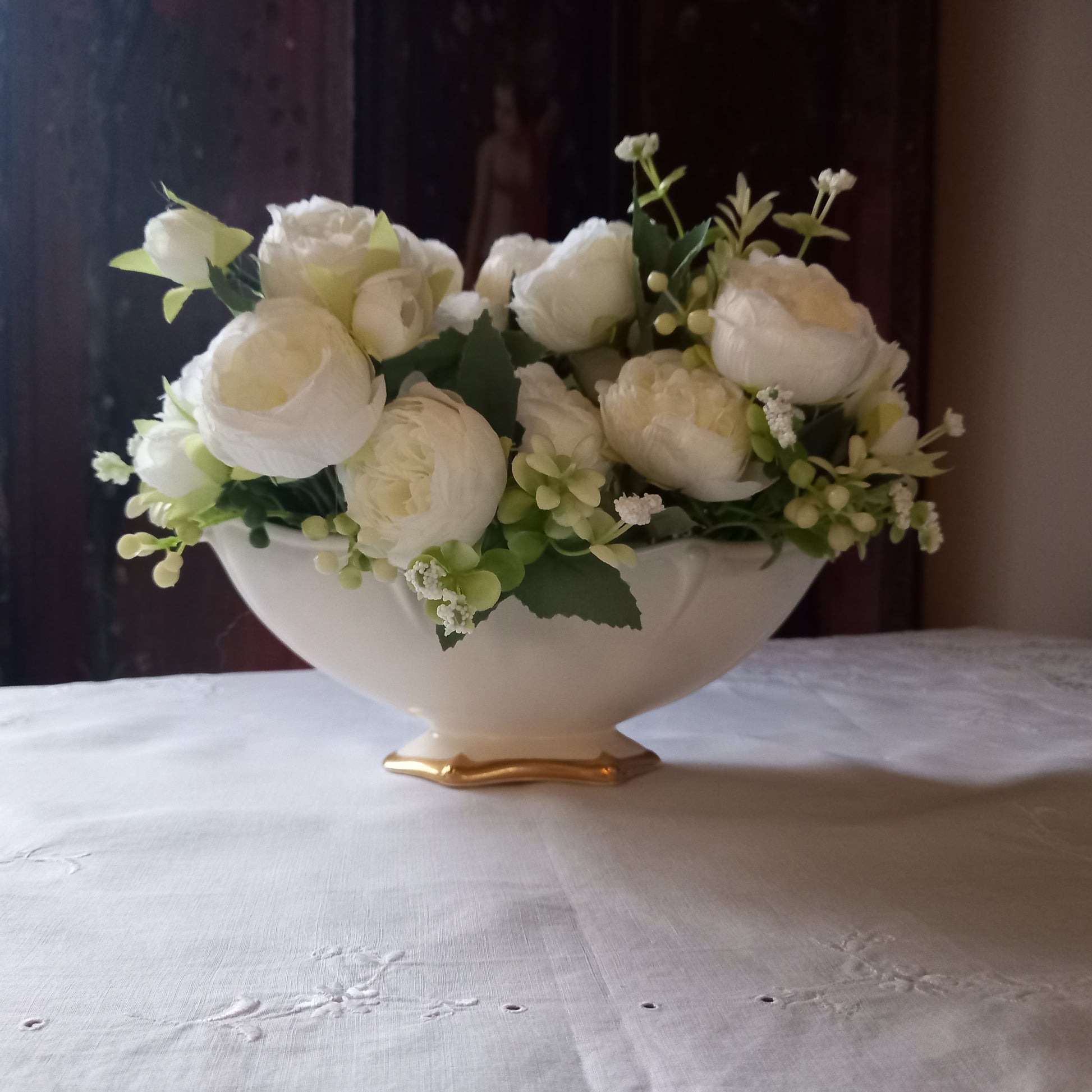Royal Winton Mantle Vase styled on a white tablecloth and filled with white silk Peony flowers and foliage